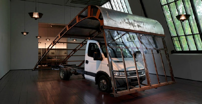 Simon Starling, Prouvé (Road Test), 2012. Truck, Jean Prouvé ‘Shed’ roof section, 1956 © Jens Ziehe/TBA21, 2012