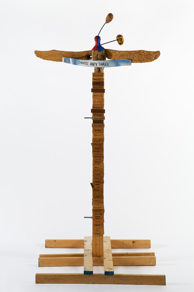 Jimmie Durham, Choose Any Three, 1989. Carved ash, magnolia, pine, metal, glass, acrylic paint, 99 1/4 × 49 1/4 × 48 inches. Hammer Museum, Los Angeles. Purchased with partial funds provided by Susan Bay Nimoy and Leonard Nimoy. Image courtesy of kurimanzutto, Mexico City.