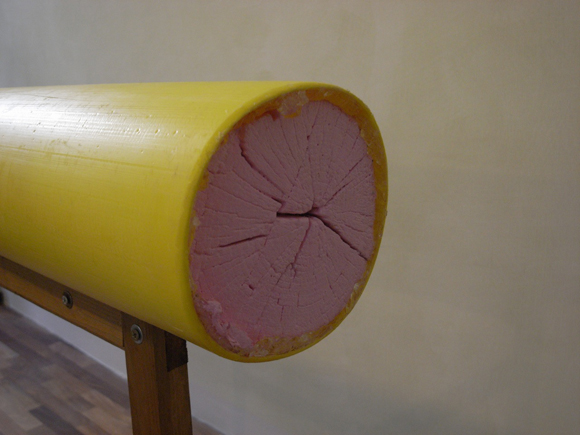 Jimmie Durham, Yellow Higgs Transmitting Apparatus (detail), 2013. PVC pipe, metal, wood, acrylic paint, glue, 94 x 29 x 87 cm.