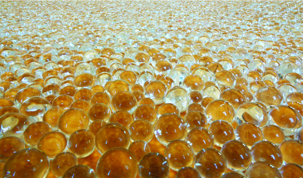 Mona Hatoum, Turbulence (detail), 2012. Clear glass marbles, 4 x 400 x 400 cm. Photo Stefan Rohner. Courtesy Kunstmuseum St. Gallen. Exhibited at Mathaf: Arab Museum of Modern Art, Doha.