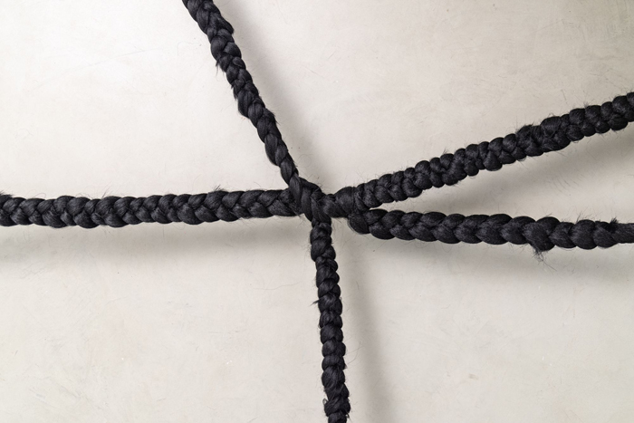 Binta Diaw, Dïà s p o r a, 2021. Synthetic hair, soil, seeds, variable dimensions. Courtesy Binta Diaw studio. Binta Diaw, Dïà s p o r a, 2021. Synthetic hair, soil, seeds, variable dimensions. Courtesy Binta Diaw studio.